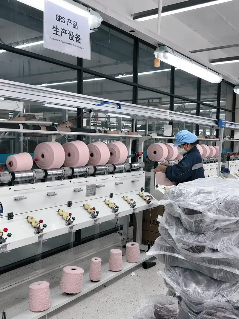 Yarn and fabric composition selection for clothing production